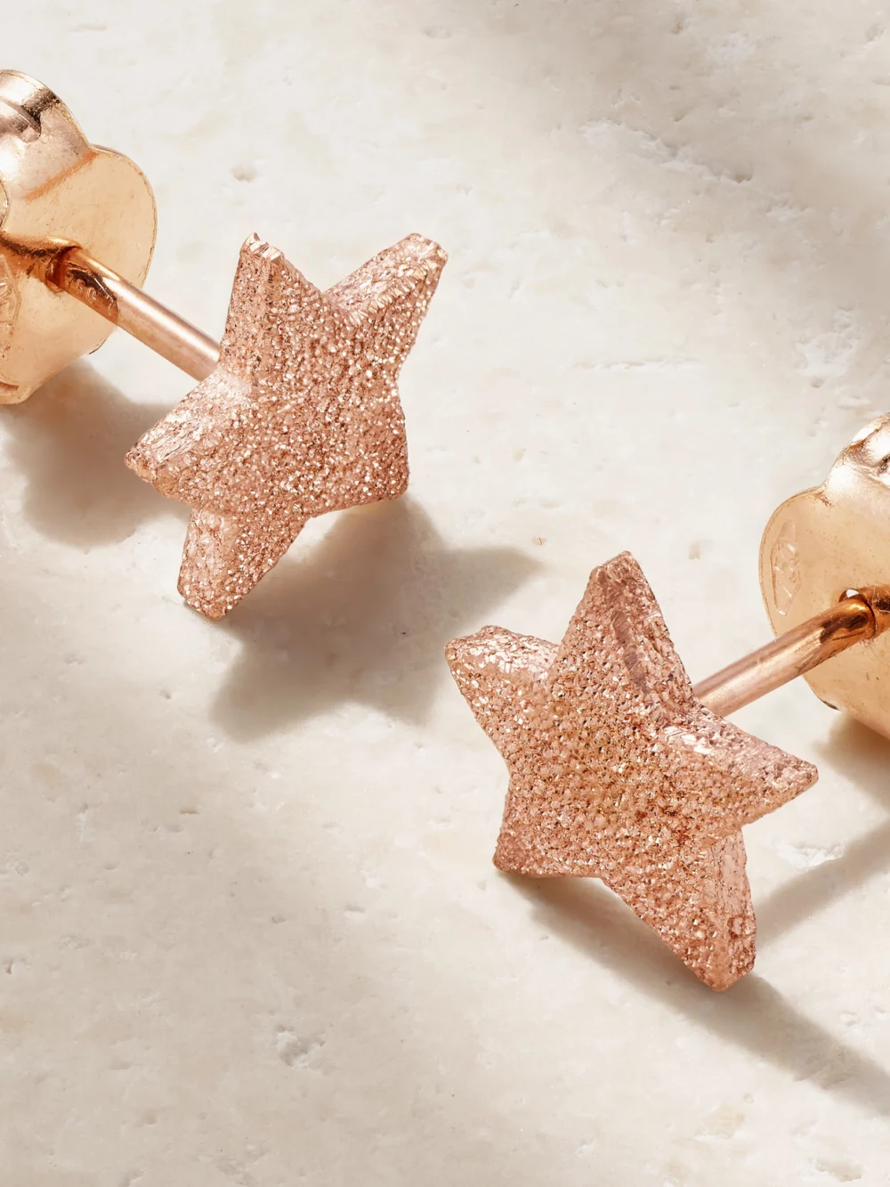 Close-up detail of the Carolina Bucci Florentine Finish Superstellar 18-karat Rose Gold Earrings