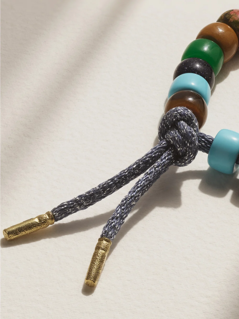 Back view of the Carolina Bucci Forte Beads Moonbow 18-karat Gold and Lurex Multi-stone Bracelet Kit