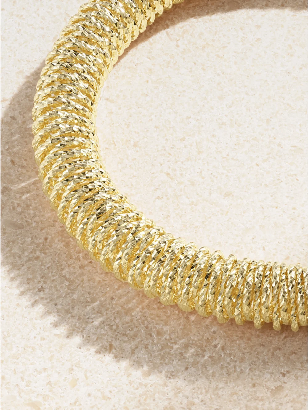Close-up detail of the Carolina Bucci K.i.s.s. Small 18-karat Gold Bracelet