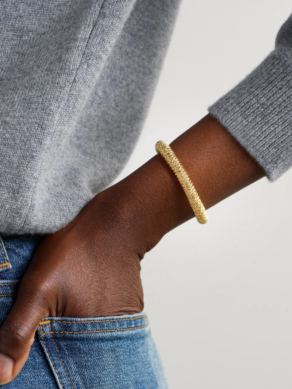 Carolina Bucci K.i.s.s. Small 18-karat Gold Bracelet, styled view