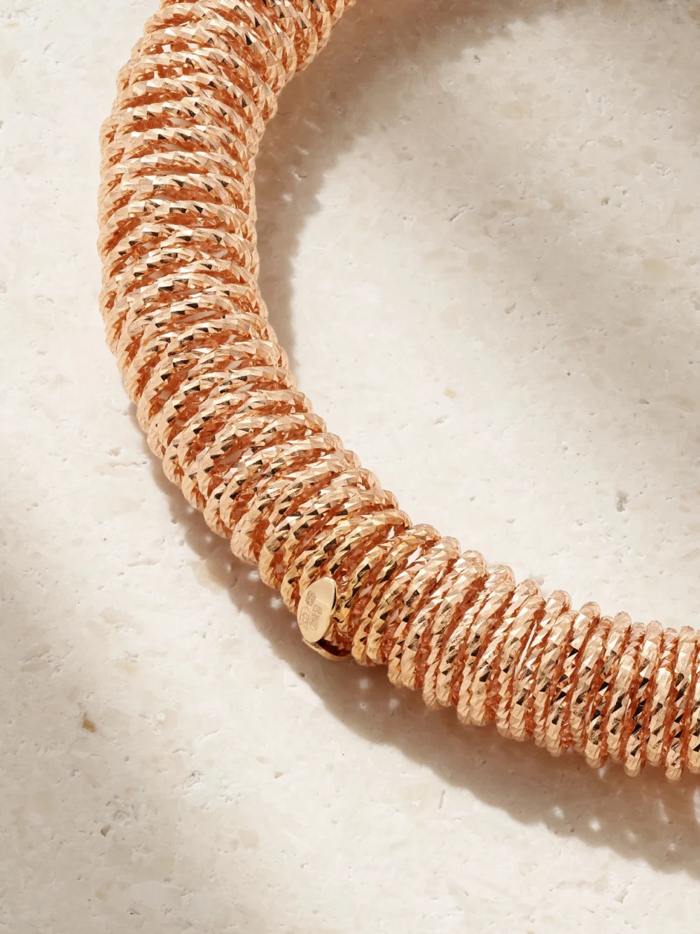 Close-up detail of the Carolina Bucci K.i.s.s. Small 18-karat Rose Gold Bracelet