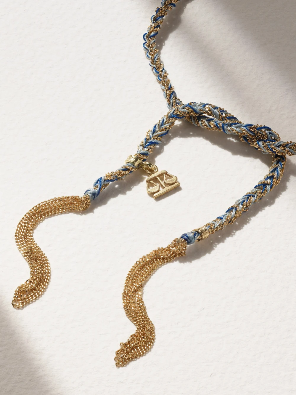 Close-up detail of the Carolina Bucci Lucky Balance + Scales 18-karat Gold and Silk Bracelet