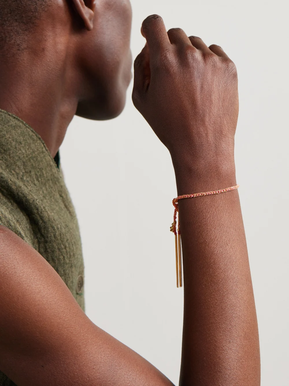 Carolina Bucci Lucky Friendship + Flower 18-karat Gold and Silk Bracelet, styled view