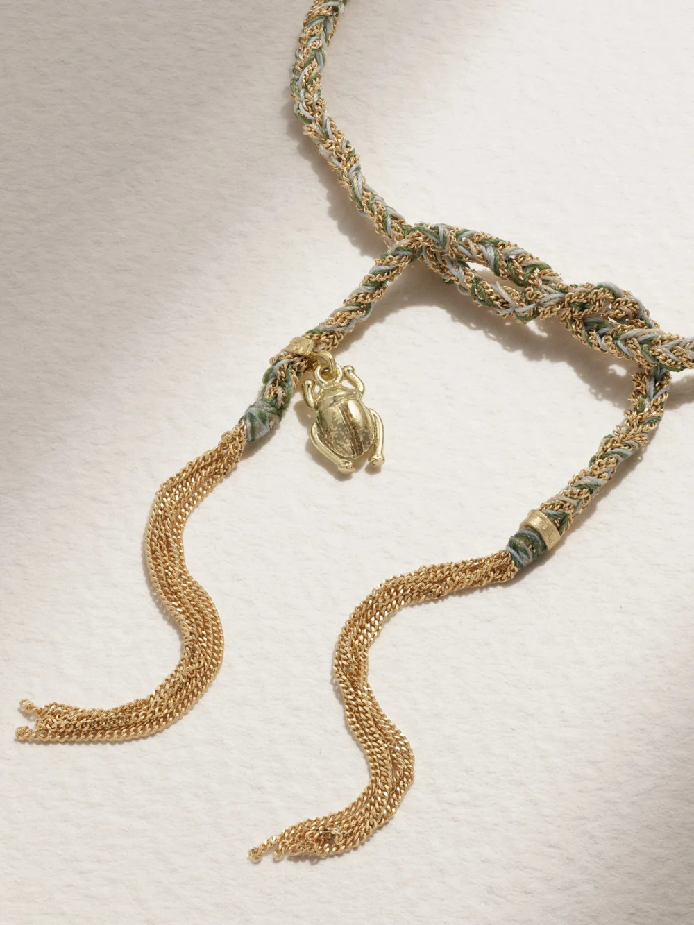 Close-up detail of the Carolina Bucci Lucky Strength + Scarab 18-karat Gold and Silk Bracelet