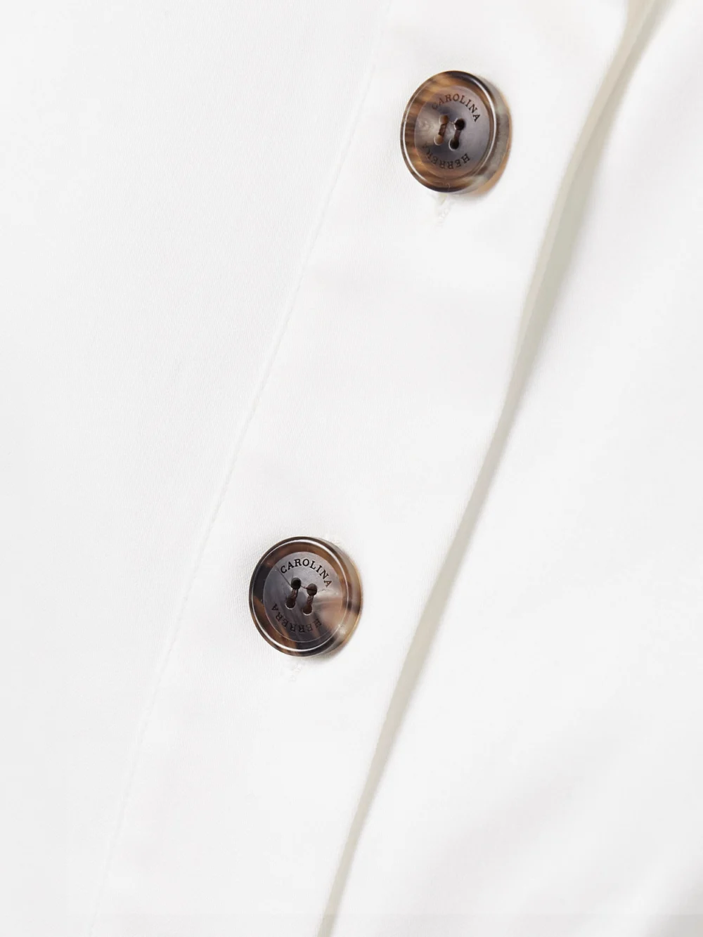 Close-up detail of the Carolina Herrera Belted Cotton-blend Sateen Halterneck Midi Shirt Dress