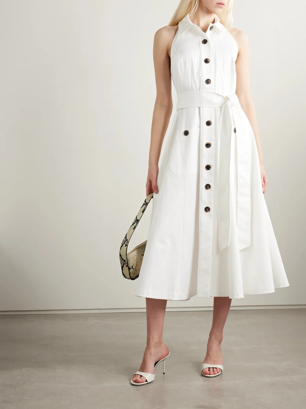 Carolina Herrera Belted Cotton-blend Sateen Halterneck Midi Shirt Dress, worn by a model