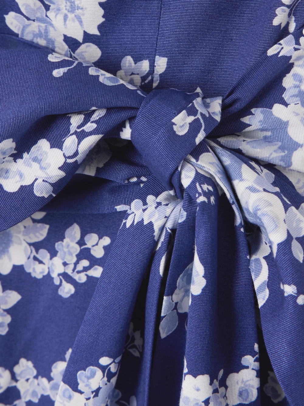Close-up detail of the Carolina Herrera Belted Floral-print Faille Midi Dress