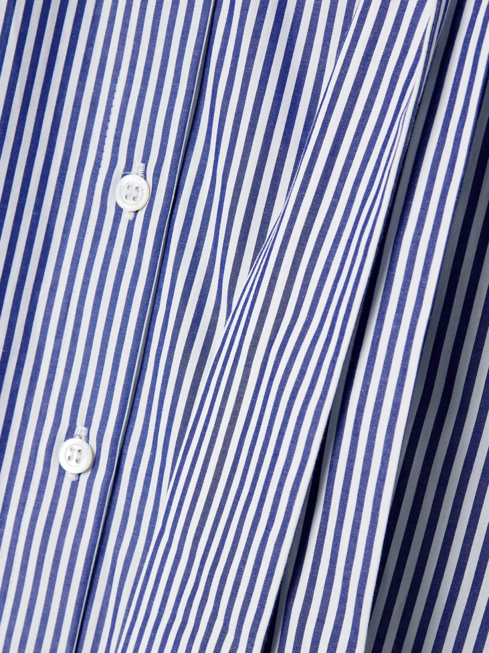 Close-up detail of the Carolina Herrera Belted Guipure Lace-trimmed Striped Cotton-poplin Midi Shirt Dress