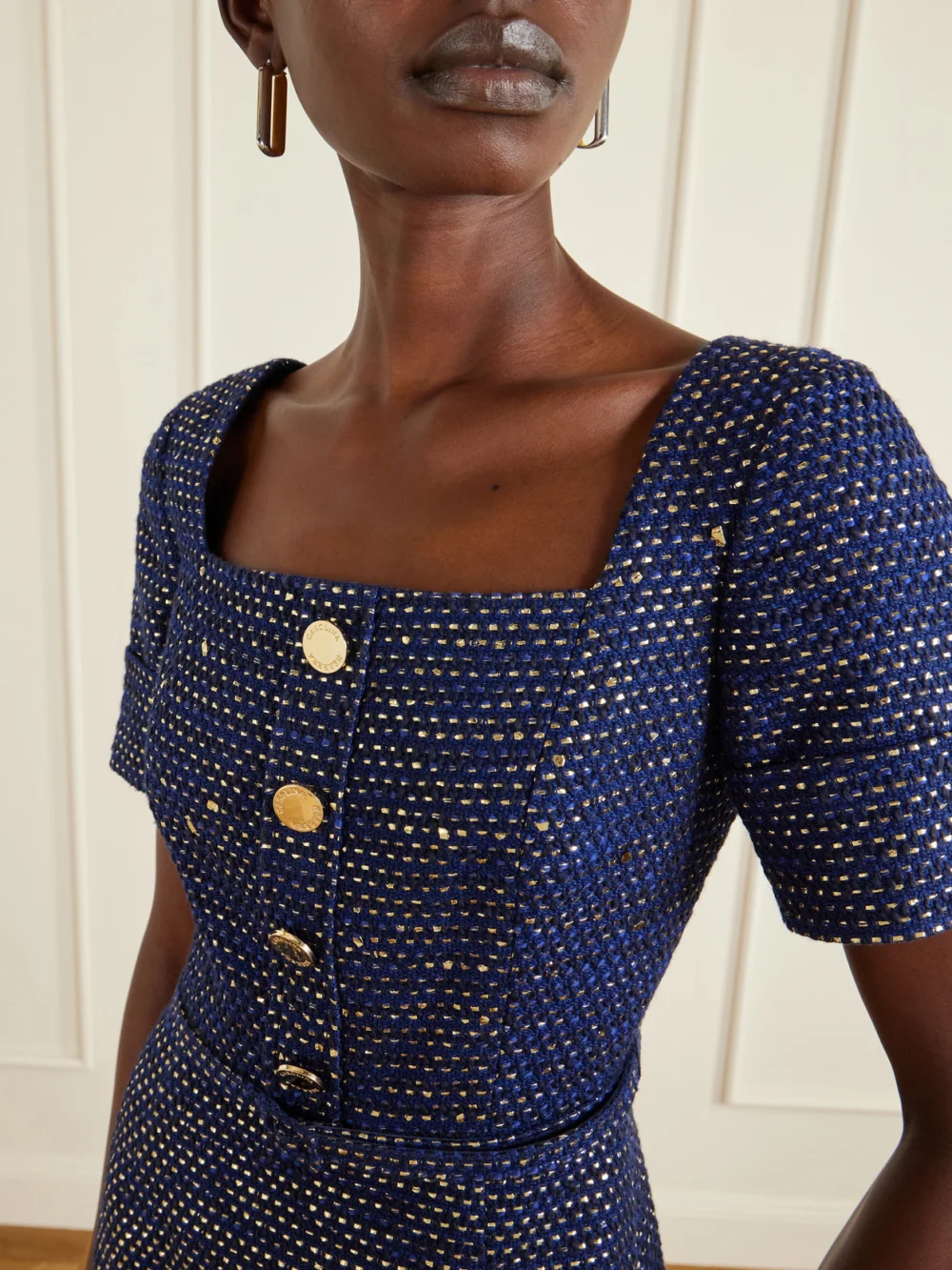 Close-up detail of the Carolina Herrera Belted Metallic Cotton-blend Tweed Midi Dress