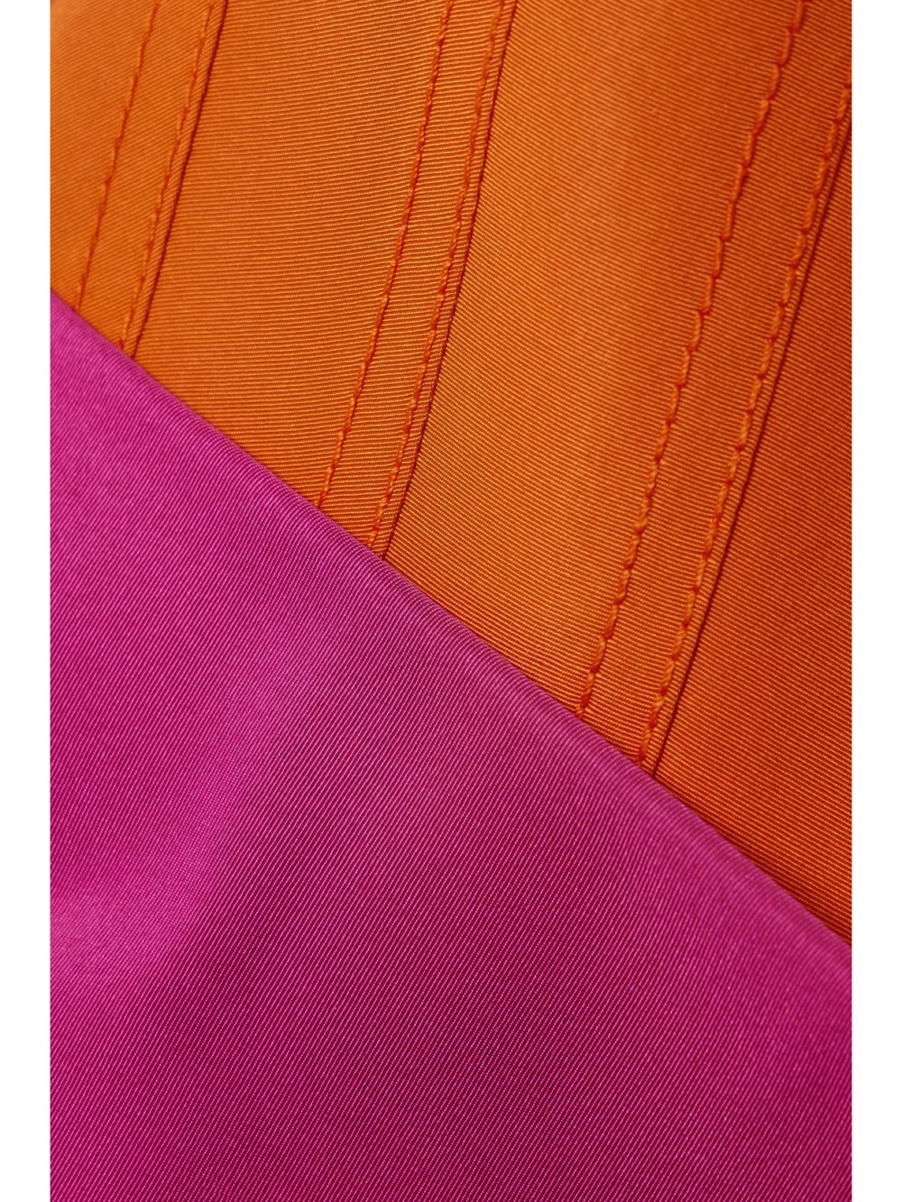 Close-up detail of the Carolina Herrera Bow-detailed Color-block Silk-faille Midi Dress