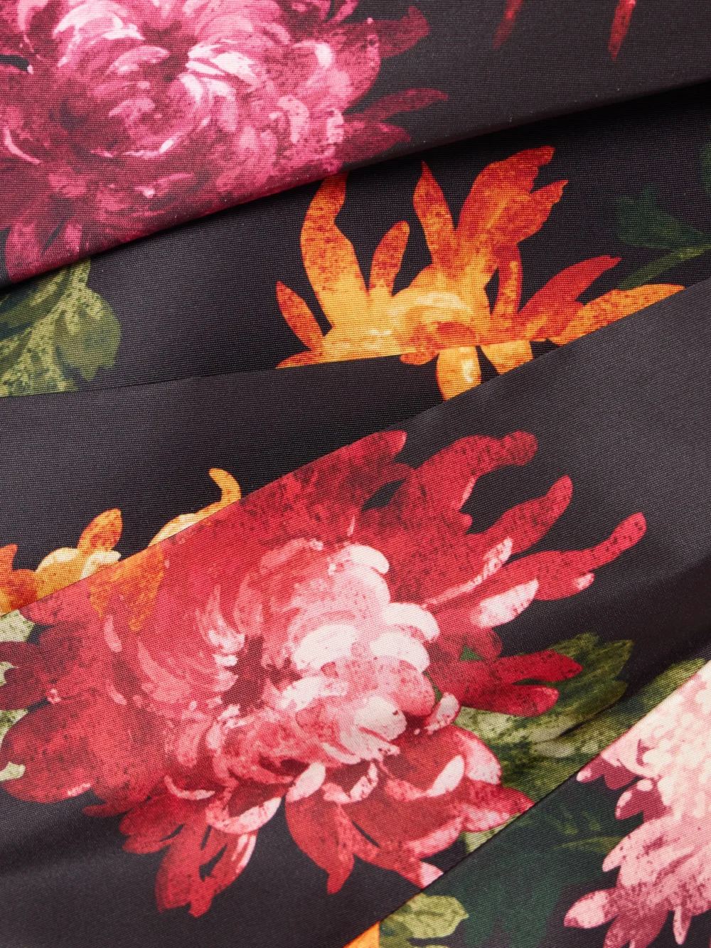 Close-up detail of the Carolina Herrera Draped Floral-print Faille Midi Dress