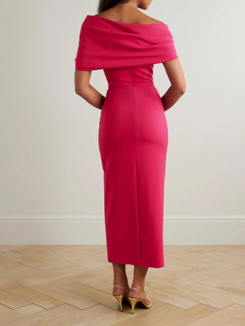 Back view of the Carolina Herrera Off-the-shoulder Draped Wool-blend Crepe Midi Dress