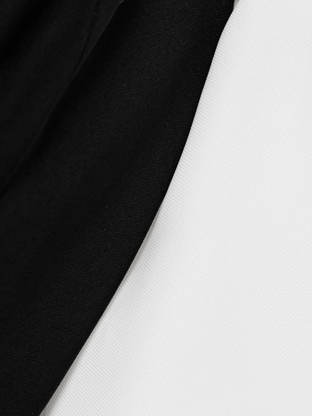 Close-up detail of the Carolina Herrera Off-the-shoulder Organza and Crepe Mini Dress