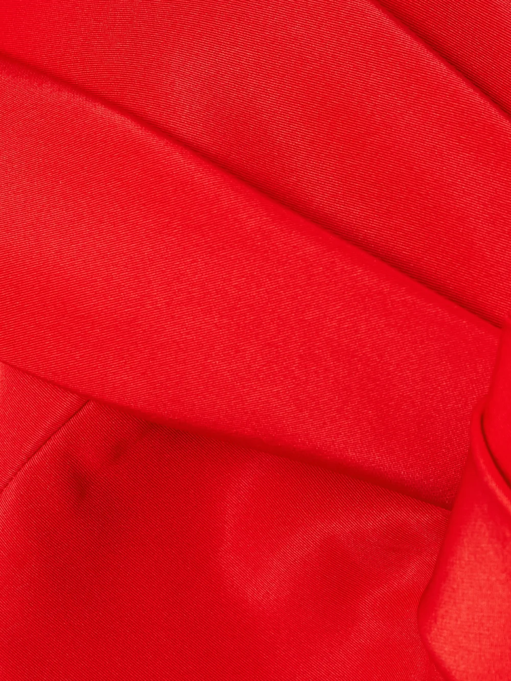 Close-up detail of the Carolina Herrera Off-the-shoulder Pleated Silk-faille Midi Dress