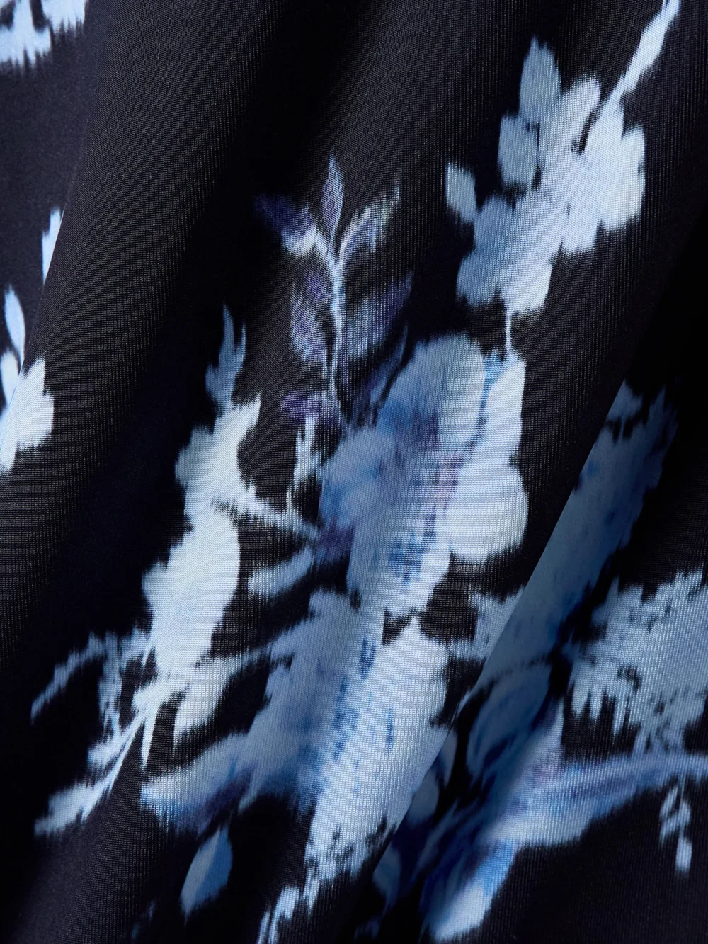 Close-up detail of the Carolina Herrera Off-the-shoulder Ruched Floral-print Stretch-jersey Midi Dress
