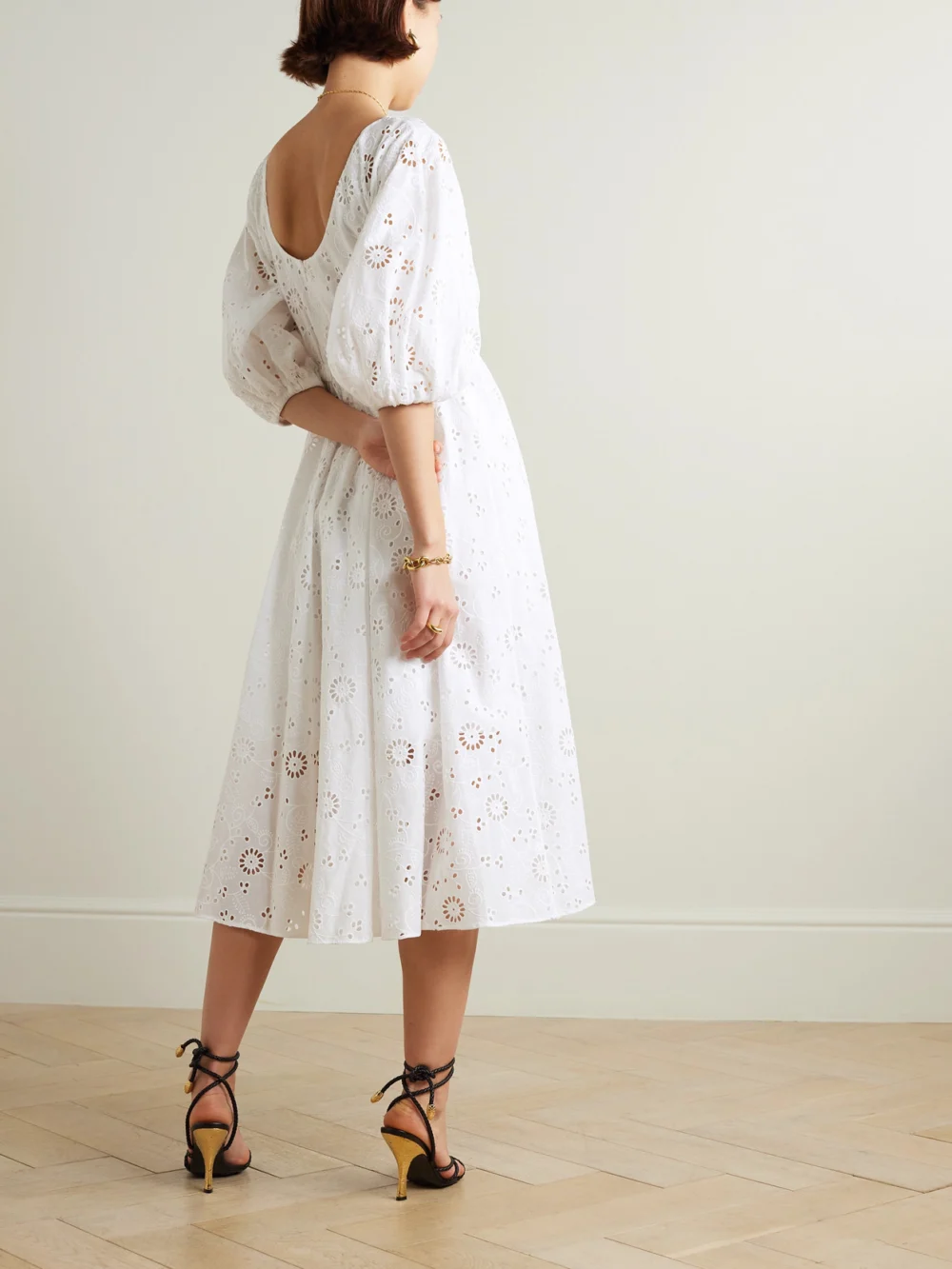 Back view of the Carolina Herrera Pleated Broderie Anglaise Cotton Midi Dress