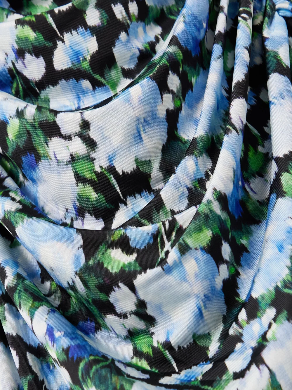 Close-up detail of the Carolina Herrera Ruched Floral-print Stretch-jersey Maxi Dress