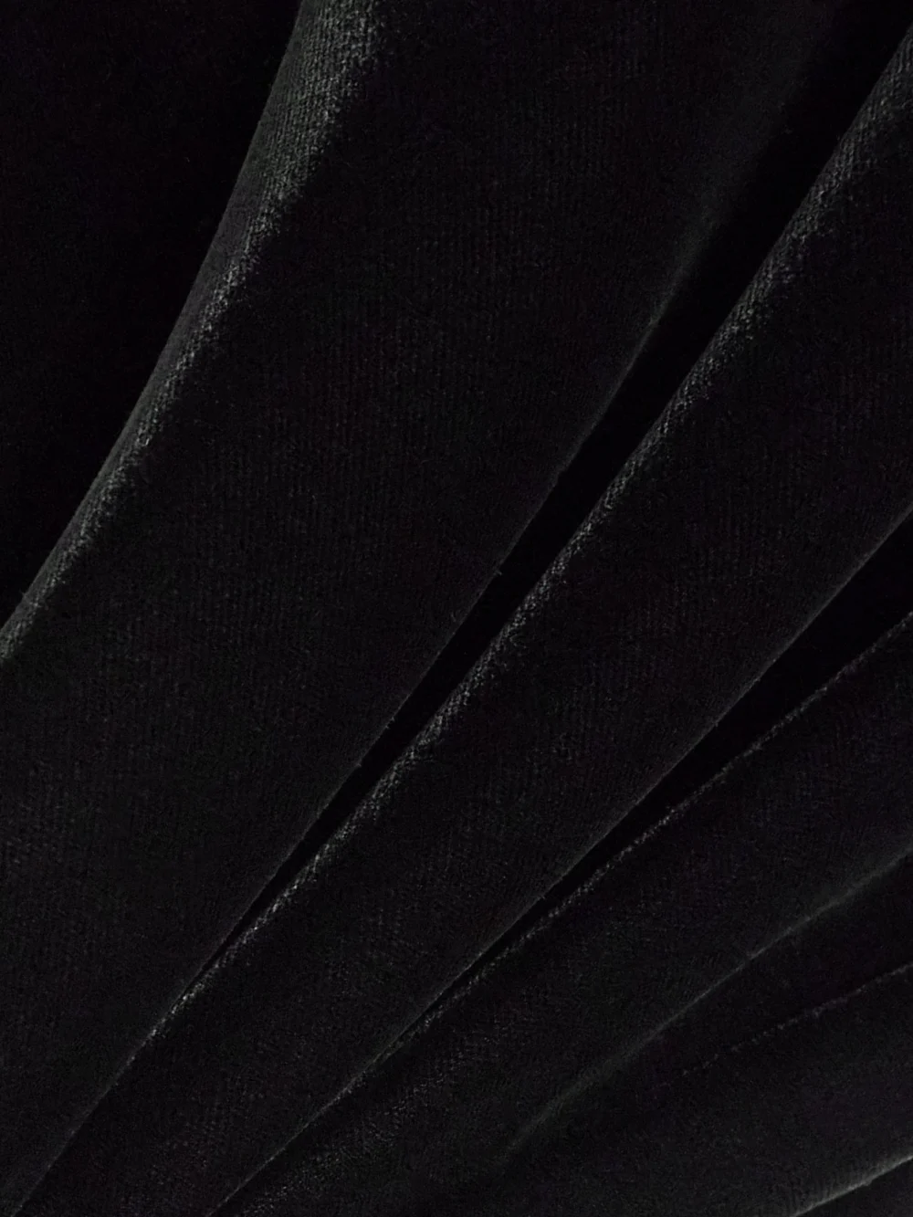 Close-up detail of the Carolina Herrera Ruched Velvet Midi Dress