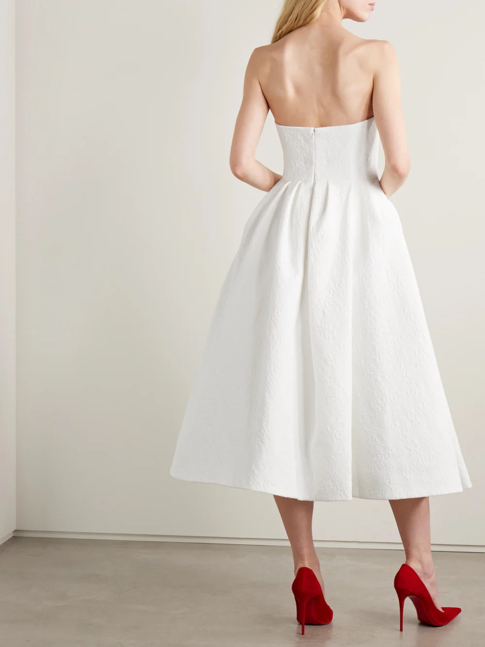 Back view of the Carolina Herrera Strapless Pleated Cotton-blend Cloqué Midi Dress