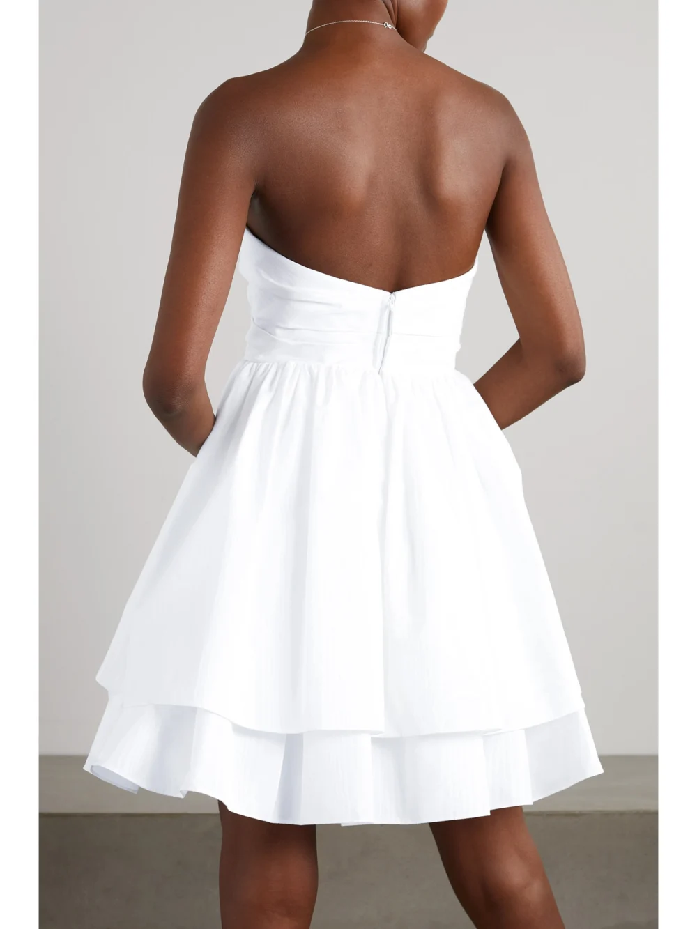 Back view of the Carolina Herrera Strapless Tiered Ruffled Cutout Moire-taffeta Mini Dress