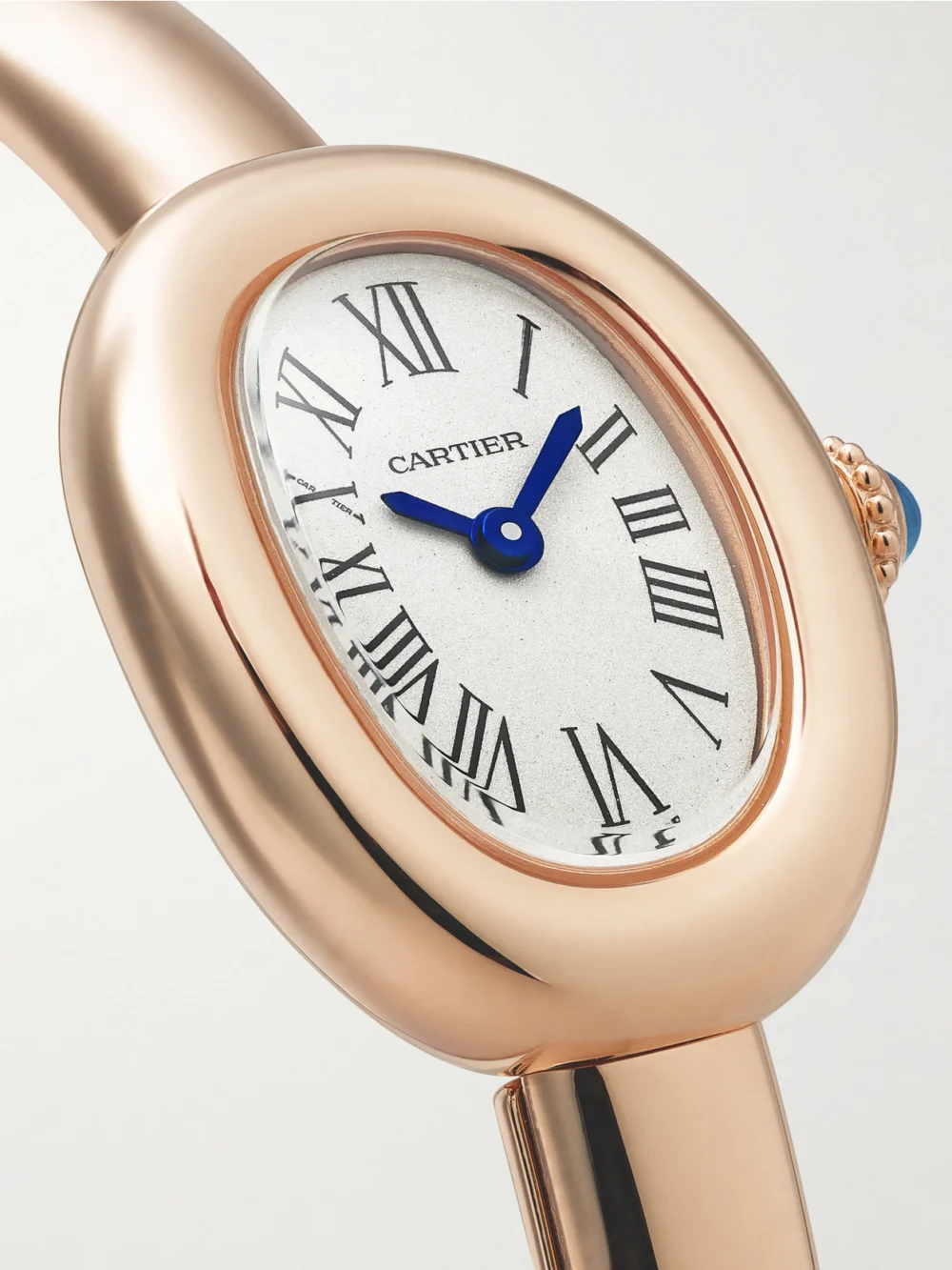 Close-up detail of the Cartier Baignoire Mini 18-karat Rose Gold Watch