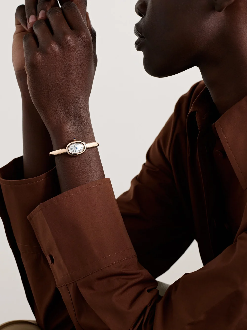 Cartier Baignoire Mini 18-karat Rose Gold Watch, styled view
