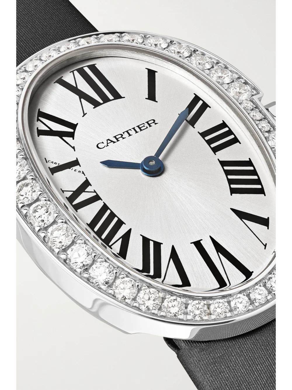 Close-up detail of the Cartier Baignoire Small 18-karat White Gold, Toile Brossée and Diamond Watch