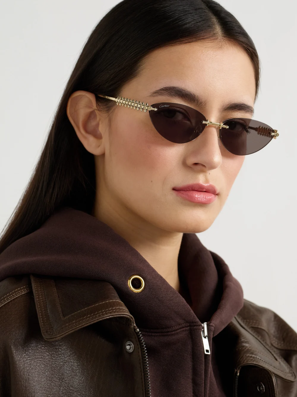 Cartier Eyewear Clash De Cartier Rimless Cat-eye Gold-tone Sunglasses, styled view