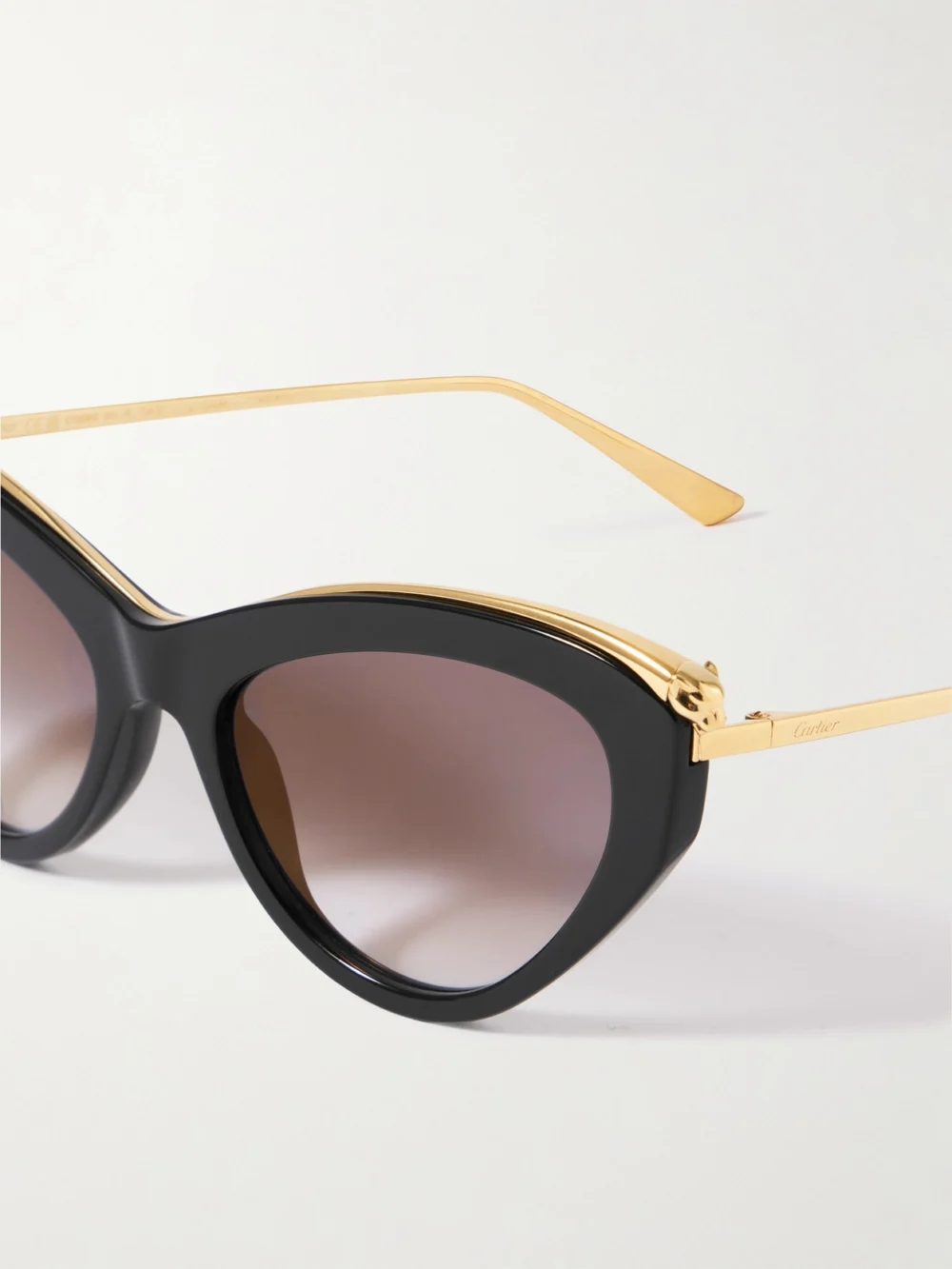 Close-up detail of the Cartier Eyewear Panthère Classic Cat-eye Acetate and Gold-tone Sunglasses
