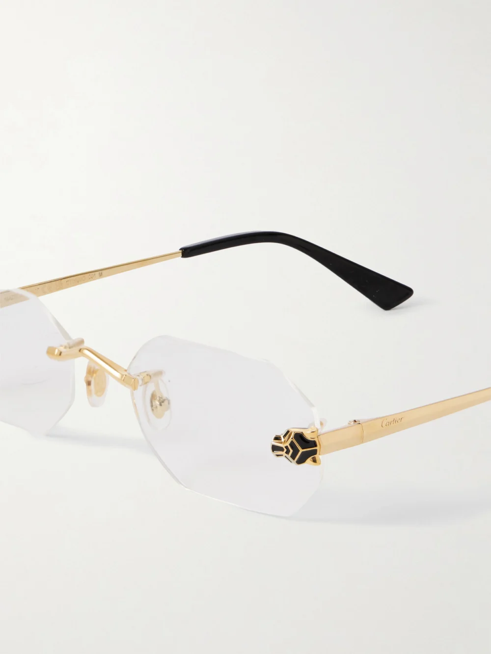 Close-up detail of the Cartier Eyewear Panthère Classic Rimless Gold-tone Optical Glasses