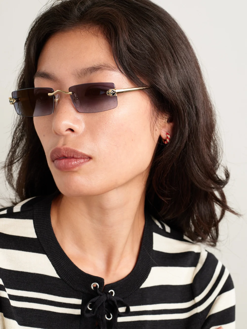 Cartier Eyewear Panthère Classic Rimless Rectangle-frame Gold-tone Sunglasses, styled view