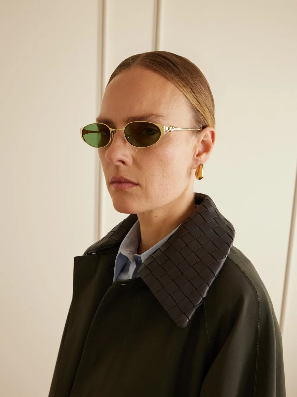 Back view of the Cartier Eyewear Panthère De Cartier Oval-frame Gold-tone Sunglasses