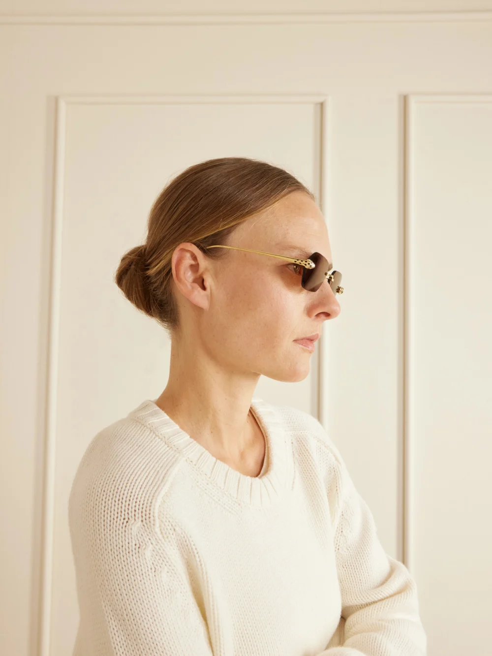Back view of the Cartier Eyewear Panthère De Cartier Rimless Hexagon-frame Gold-tone Sunglasses