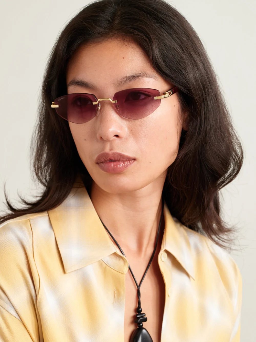 Cartier Eyewear Signature C Décor Rimless Cat-eye Gold-tone and Acetate Sunglasses, styled view