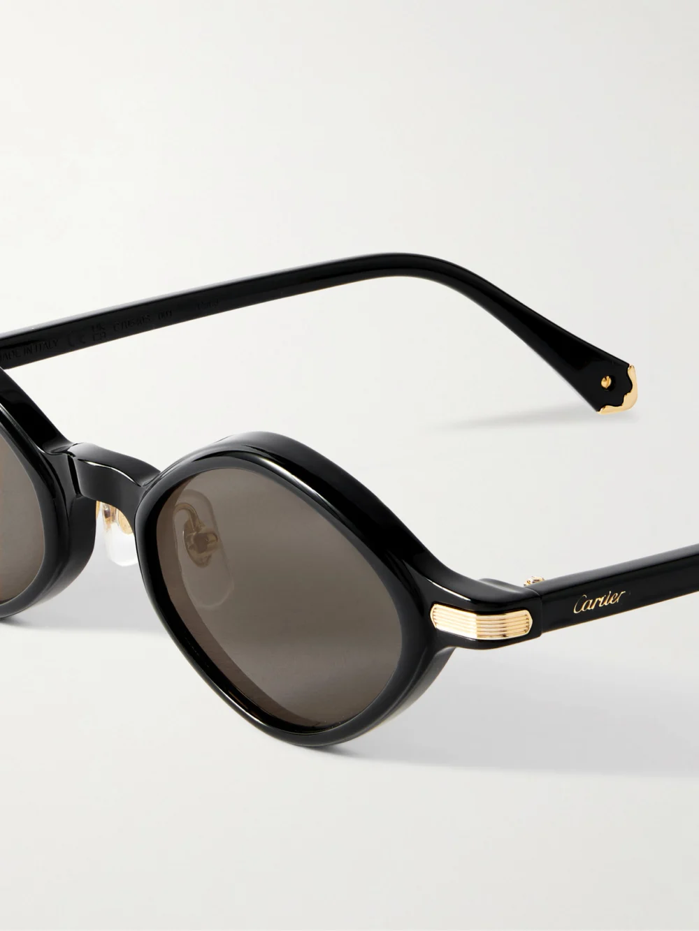 Close-up detail of the Cartier Eyewear Signature Round-frame Acetate Sunglasses