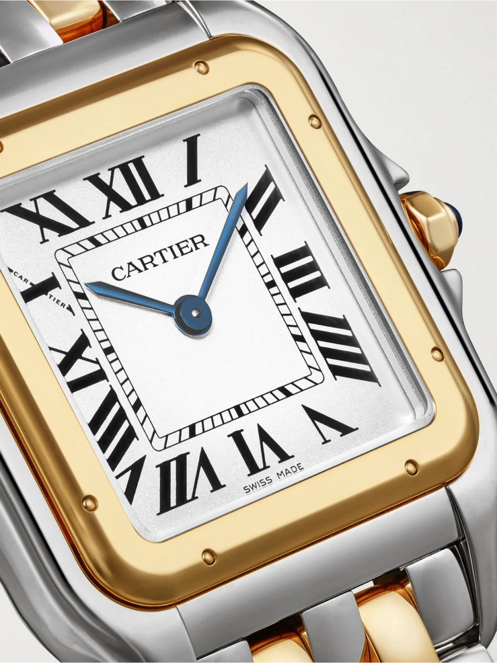 Close-up detail of the Cartier Panthère De Cartier Large 18-karat Gold and Stainless Steel Watch