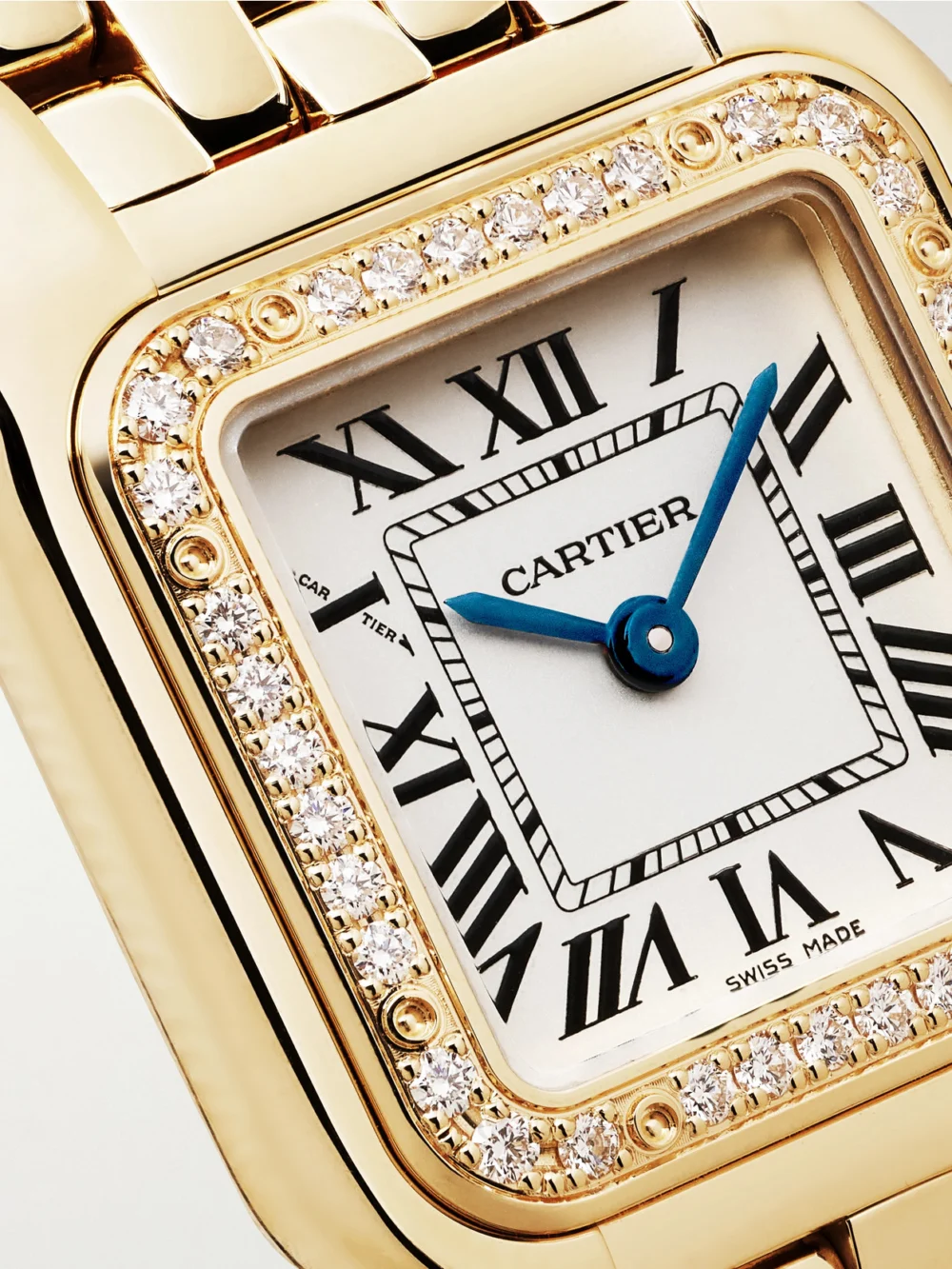 Close-up detail of the Cartier Panthère De Cartier Small 18-karat Gold Diamond Watch