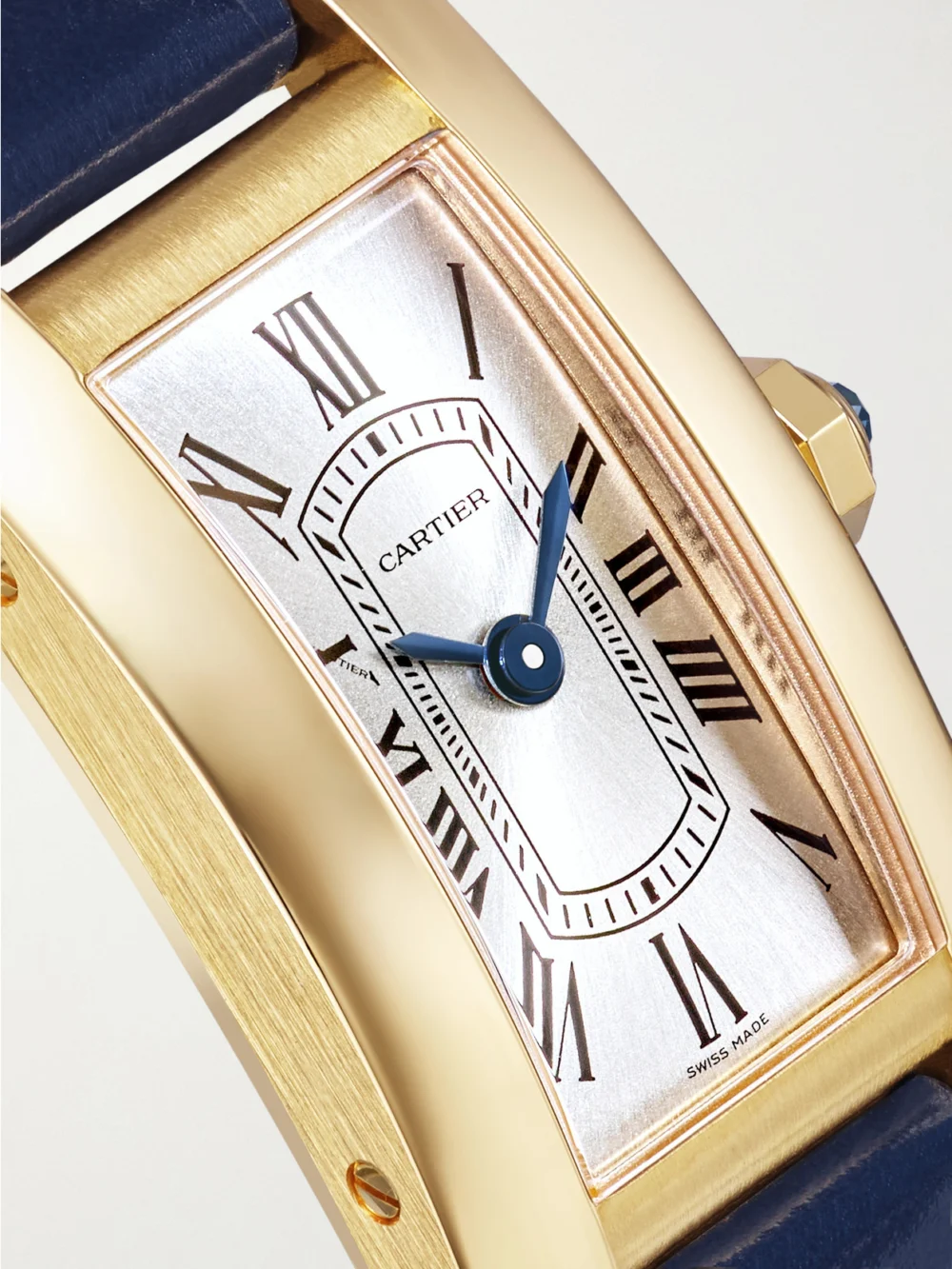 Close-up detail of the Cartier Tank Américaine 28mm Small 18-karat Gold Alligator Watch