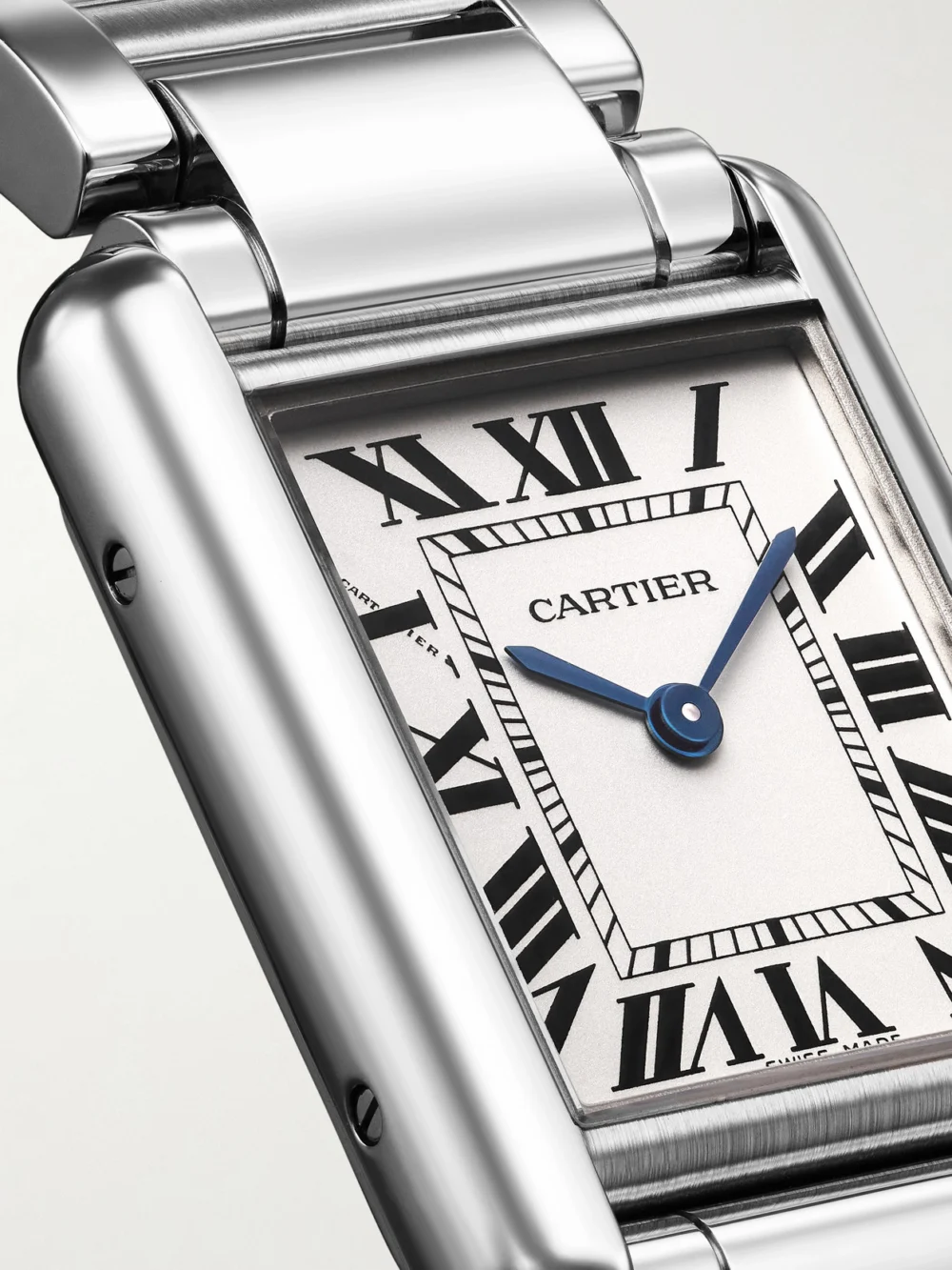Close-up detail of the Cartier Tank Must De Cartier Small Solarbeat™ Stainless Steel Watch