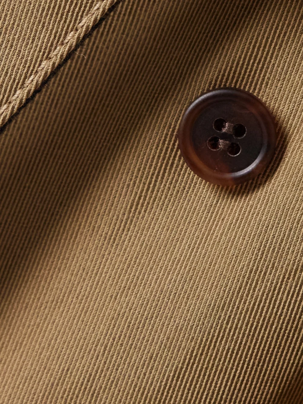 Close-up detail of the Carven Double-breasted Wool-felt Trimmed Cotton-blend Twill Trench Coat