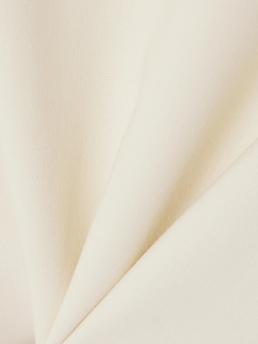 Close-up detail of the Carven Fringed Scarf-detailed Silk-trimmed Wool-blend Blouse