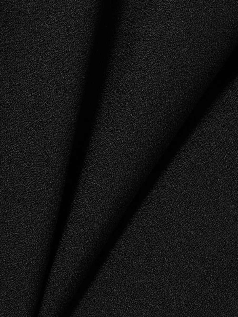 Close-up detail of the Carven Jersey Peplum Top