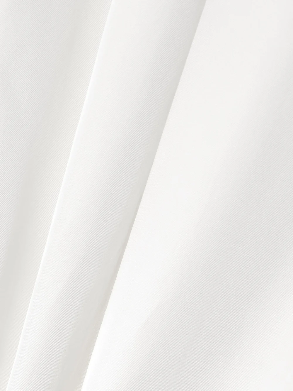 Close-up detail of the Carven Pleated Gabardine Shorts