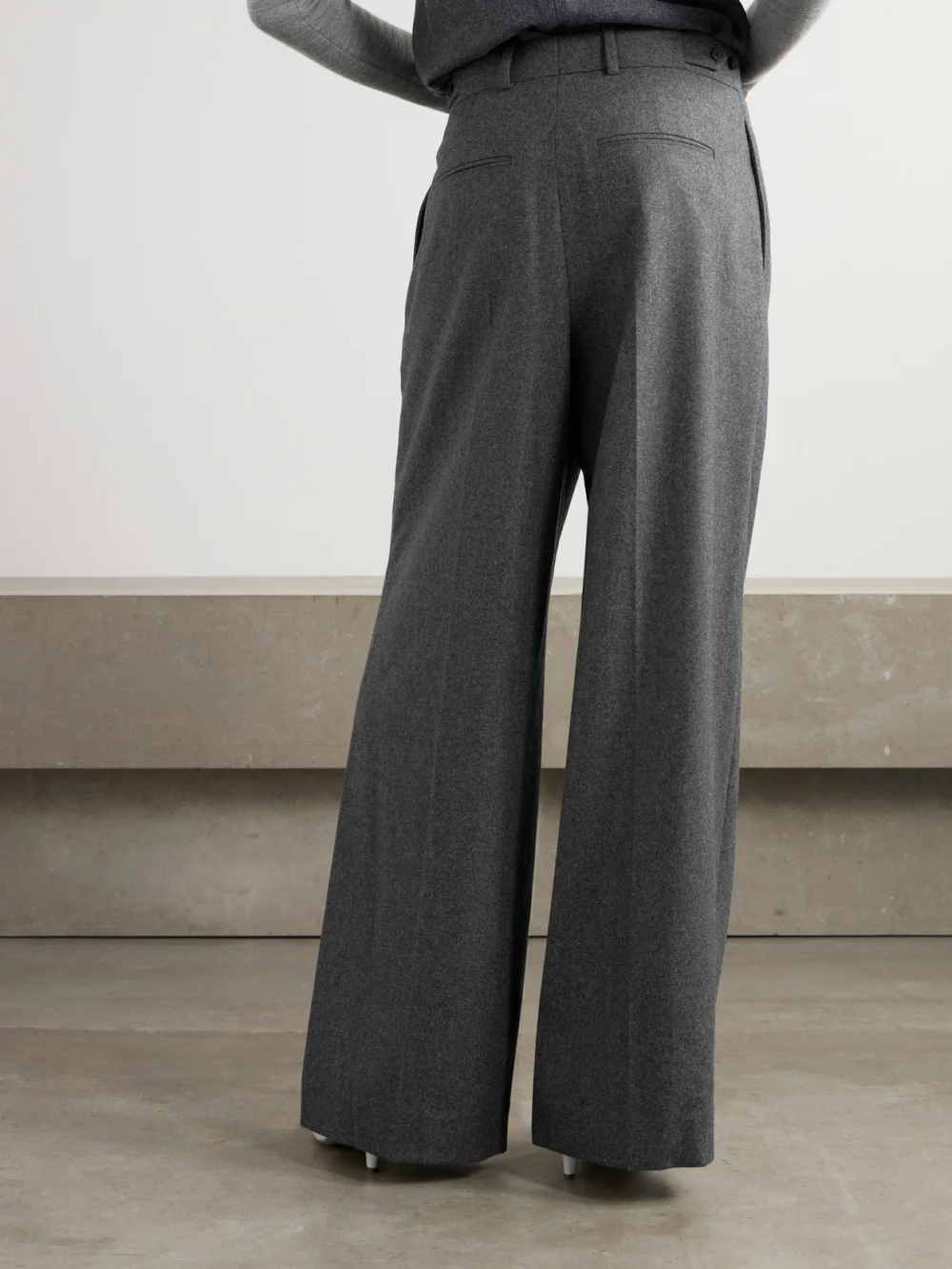 Back view of the Carven Pleated Wide-leg Wool Trousers