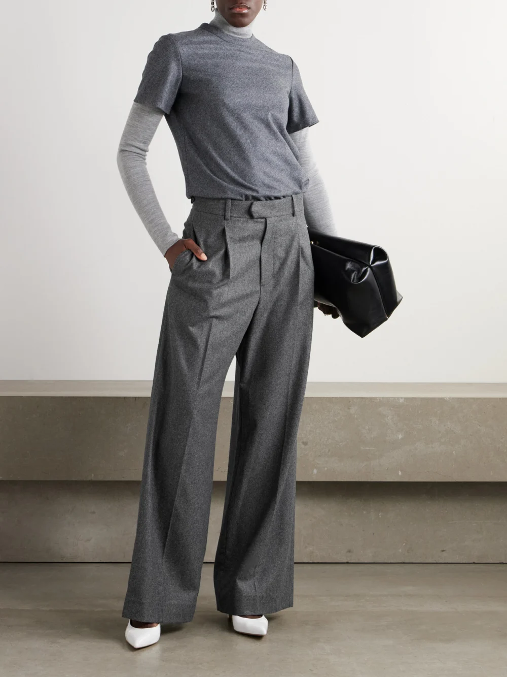 Carven Pleated Wide-leg Wool Trousers, worn by a model