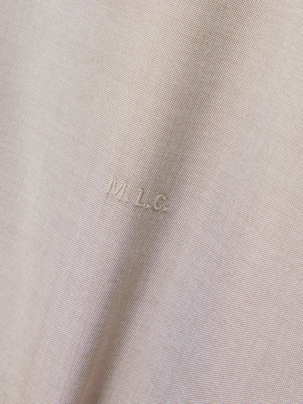 Close-up detail of the Carven Silk Midi Dress