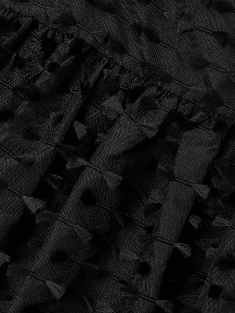 Close-up detail of the Cecilie Bahnsen Babette Fil Coupé Shell Peplum Top