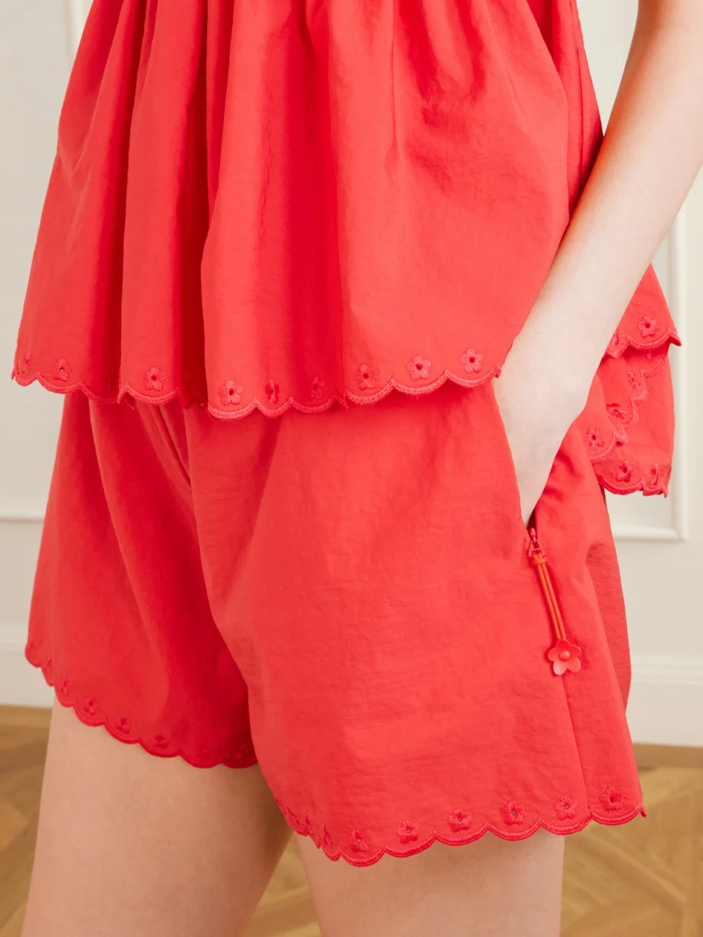 Close-up detail of the Cecilie Bahnsen Blossom Broderie Anglaise-trimmed Cotton-blend Taffeta Shorts