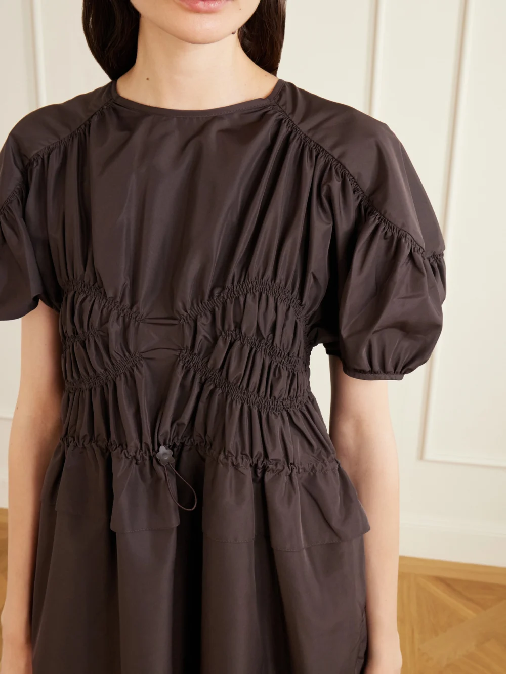 Close-up detail of the Cecilie Bahnsen Cbbetsy Gathered Faille Midi Dress