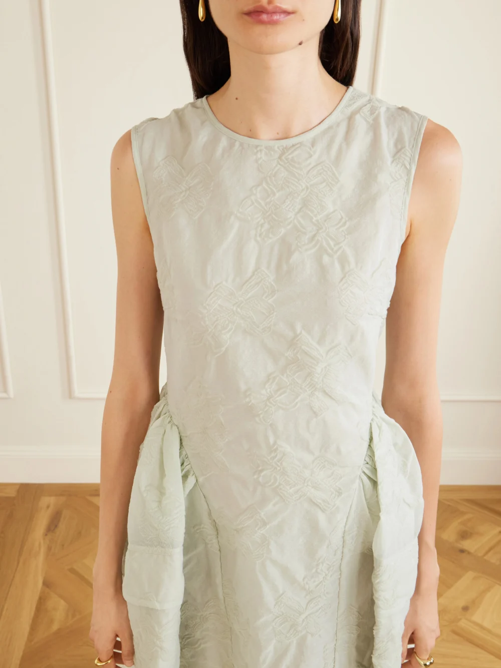 Close-up detail of the Cecilie Bahnsen Cbduana Papillon Matelassé Maxi Dress